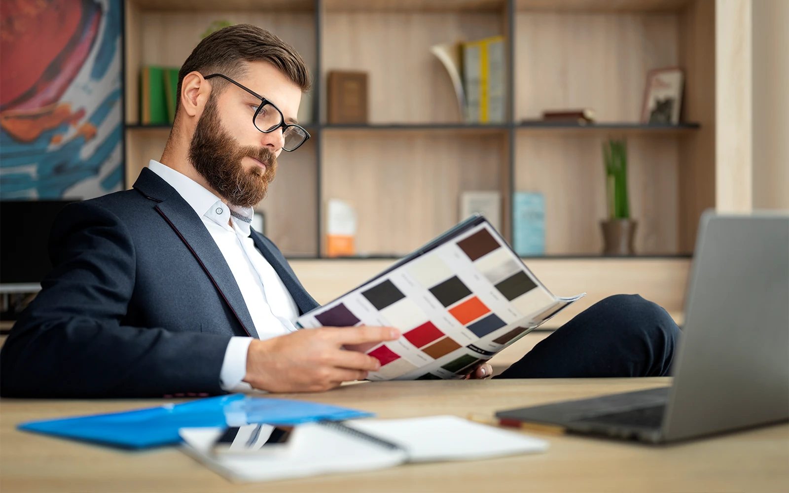 Brand professional reviewing a visual color guide