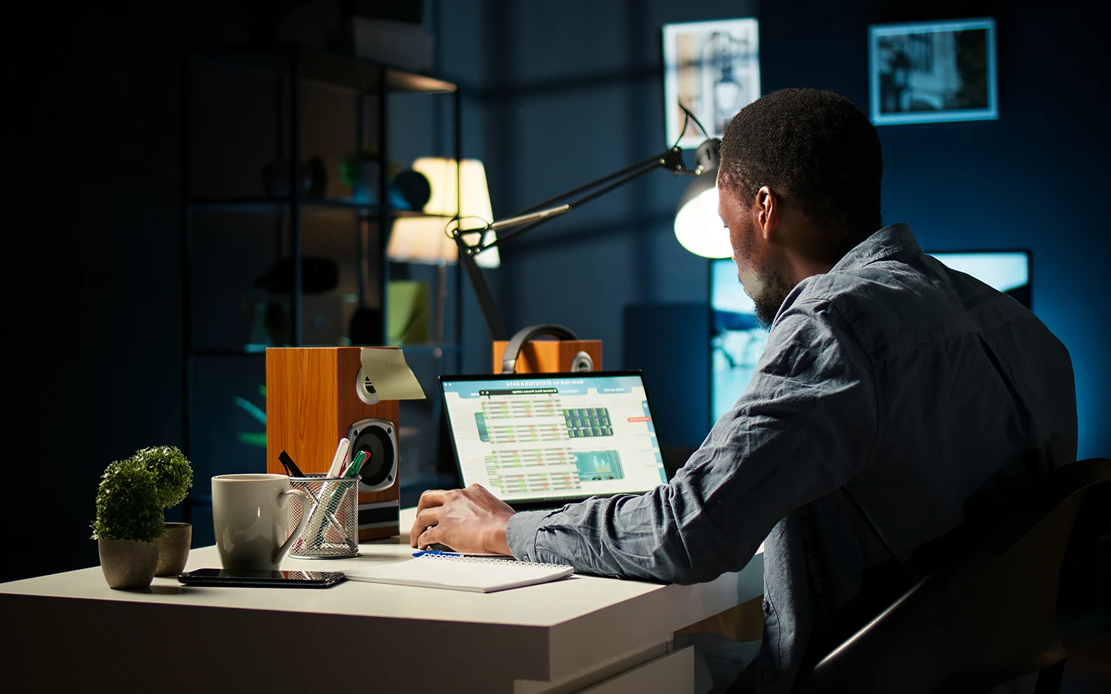 Professional working on a website from a laptop